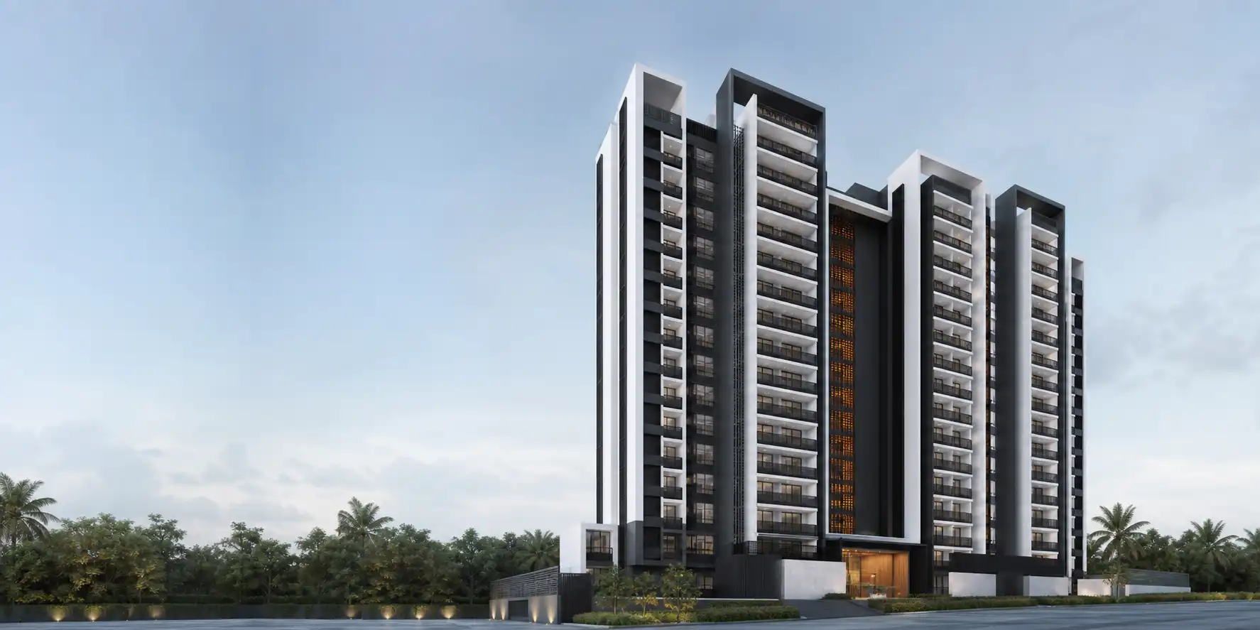 Contemporary high-rise residential elevation with warm lighting and landscaped foreground